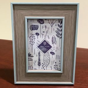 4x6” plastic picture frame, brownish gray with light blue trim, never used